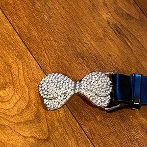Black leather belt with rhinestone bow 46”